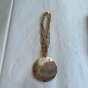 Beaded chain with a round multi-colored shell. Free with any bundle